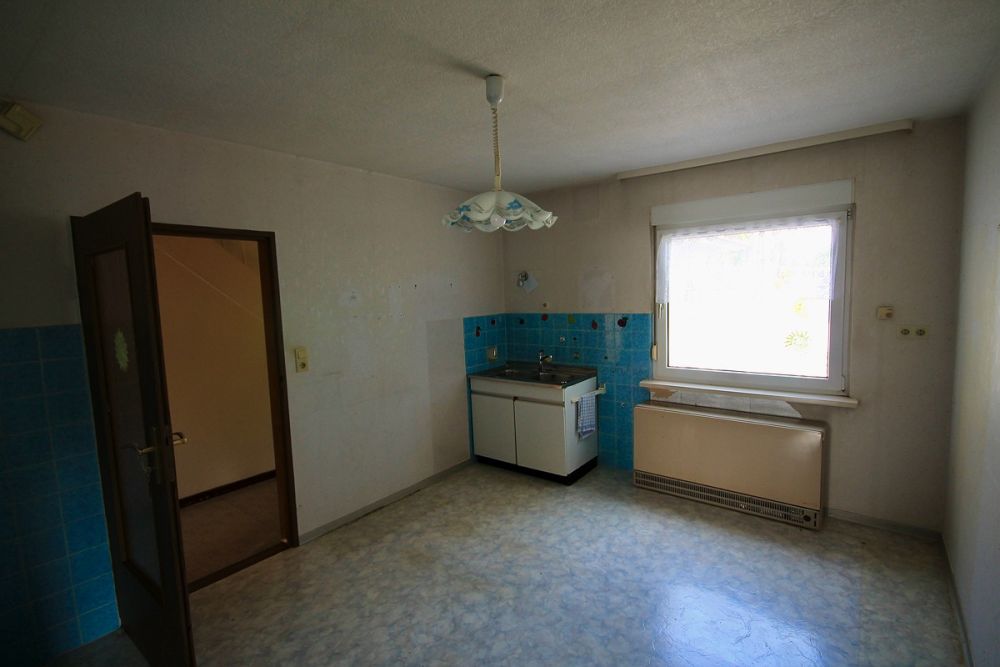 Idyllische Mainlage: Doppelhaushälfte mit Erholungsgrundstück in erster Reihe