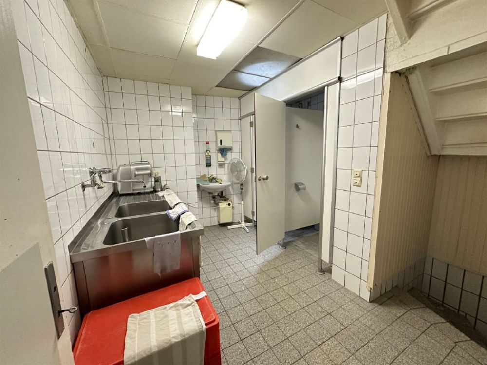 Wohn- und Geschäftshaus mit Ausbaupotenzial in zentraler Lage!