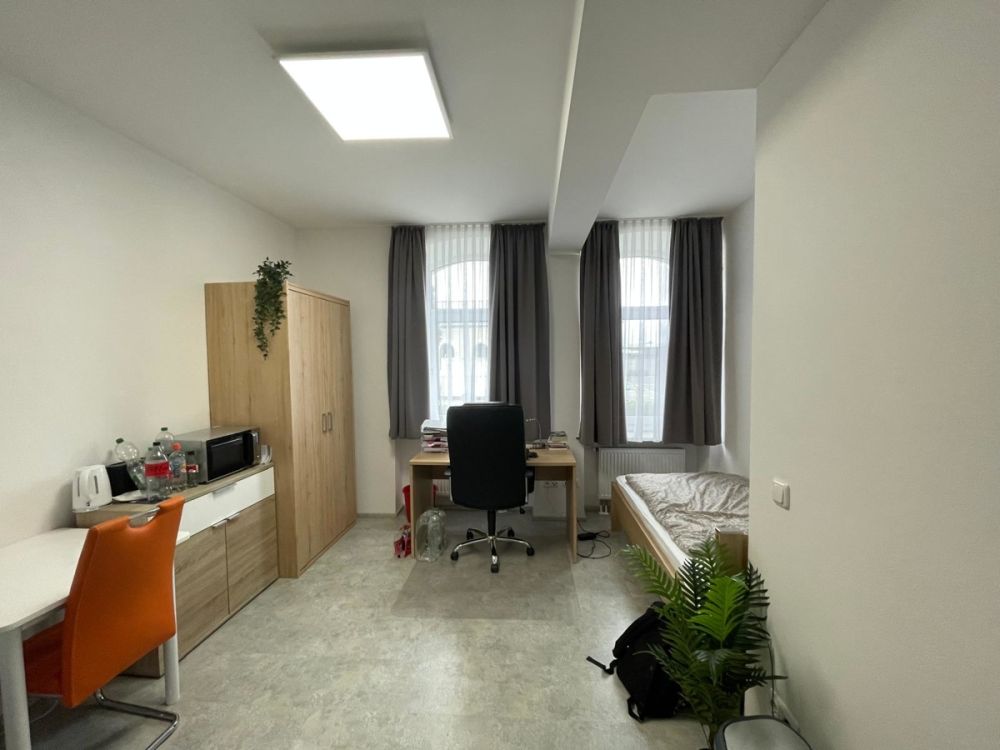 Attraktives Mehrfamilienhaus mit 11 Apartments und Top-Lage direkt am sanierten Bahnhof