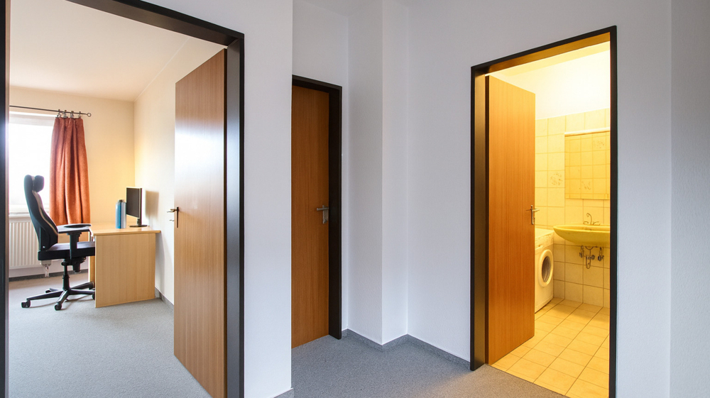 Kapitalanlage! Gepflegte 2-Zimmer-OG-Wohnung mit Balkon und TG-Stellplatz im Zentrum von Bad Zw'ahn