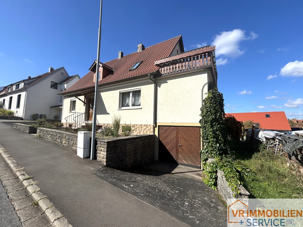 Mehr als nur vier Wände! - Einfamilienhaus mit Nebengebäude, Doppelgarage & Garten in 97618 Wollbach!