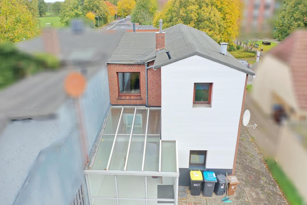 Ein Zuhause mit Potenzial – gemütliche Doppelhaushälfte mit Wintergarten, Carport und Gewächshaus
