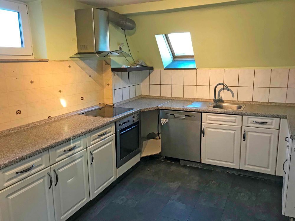 Große Dachgeschosswohnung mit Gartenanteil