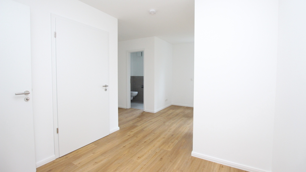 Stilvolle 3-Zimmer-Neubau-Wohnung im OG mit Wintergarten in zentraler Lage von Varel nahe Dangast