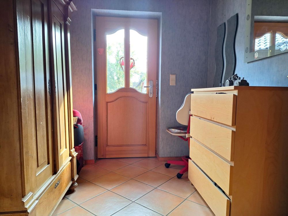 Hyygeliges, ebenerdiges Holzhaus in ruhiger Feldrandlage