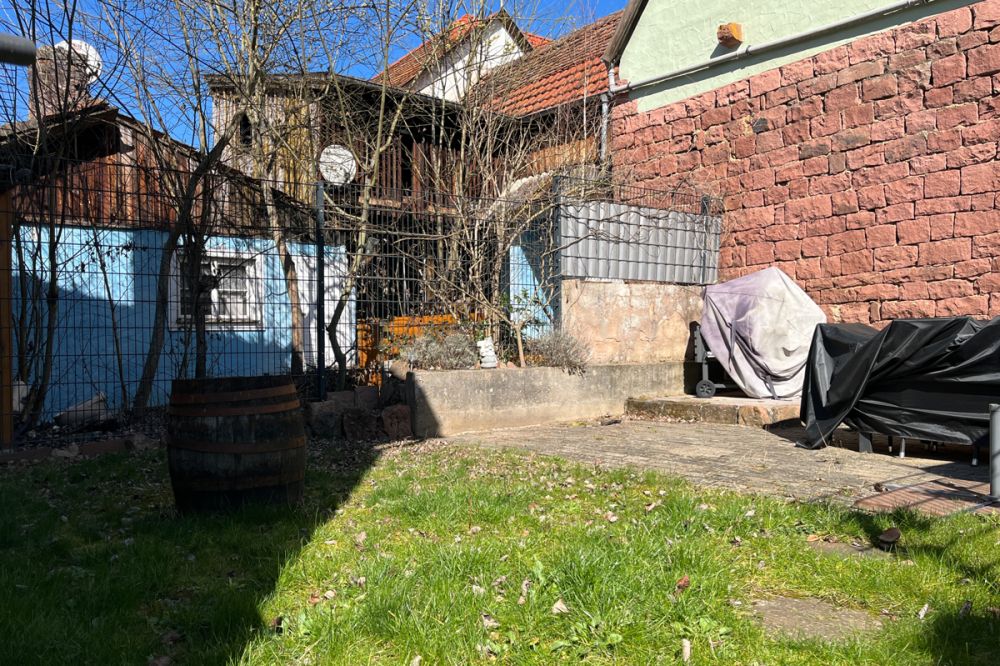 Modernisiertes Familiennest mit Potenzial – Wohnen & Erweitern in Faulbach