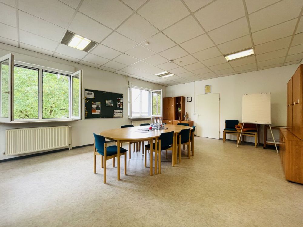 Wohn & Gewerbeeinheit in Rüsslesheim - Mietpotenzial & Eigennutzer