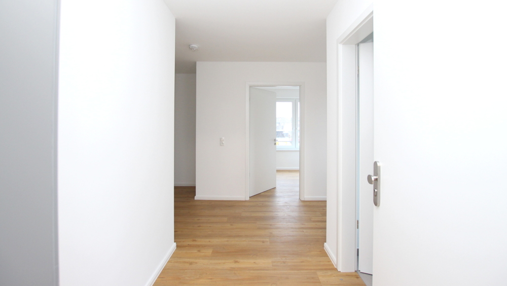 Stilvolle 3-Zimmer-Neubau-Wohnung im OG mit Wintergarten in zentraler Lage von Varel nahe Dangast