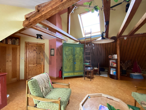 Mehrfamilienhaus mit Gewerbeeinheit (teilvermietet) und großem Garten