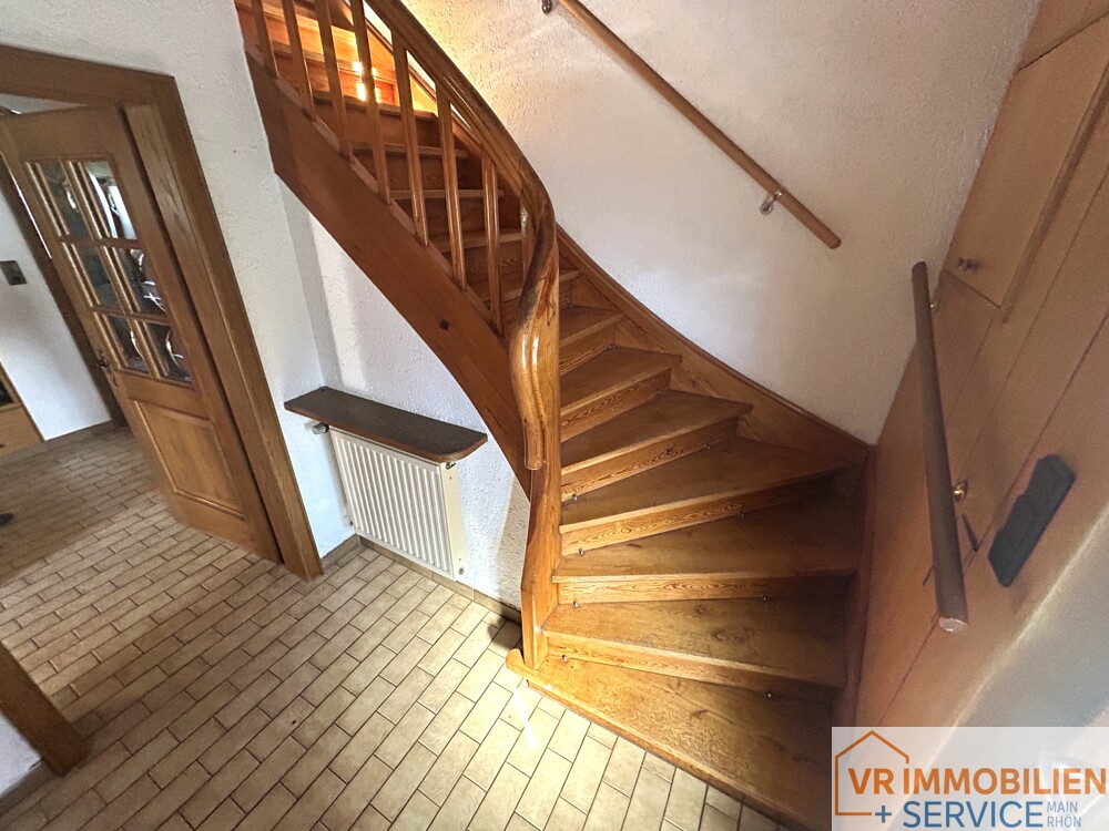 Mehr als nur vier Wände! - Einfamilienhaus mit Nebengebäude, Doppelgarage & Garten in 97618 Wollbach!