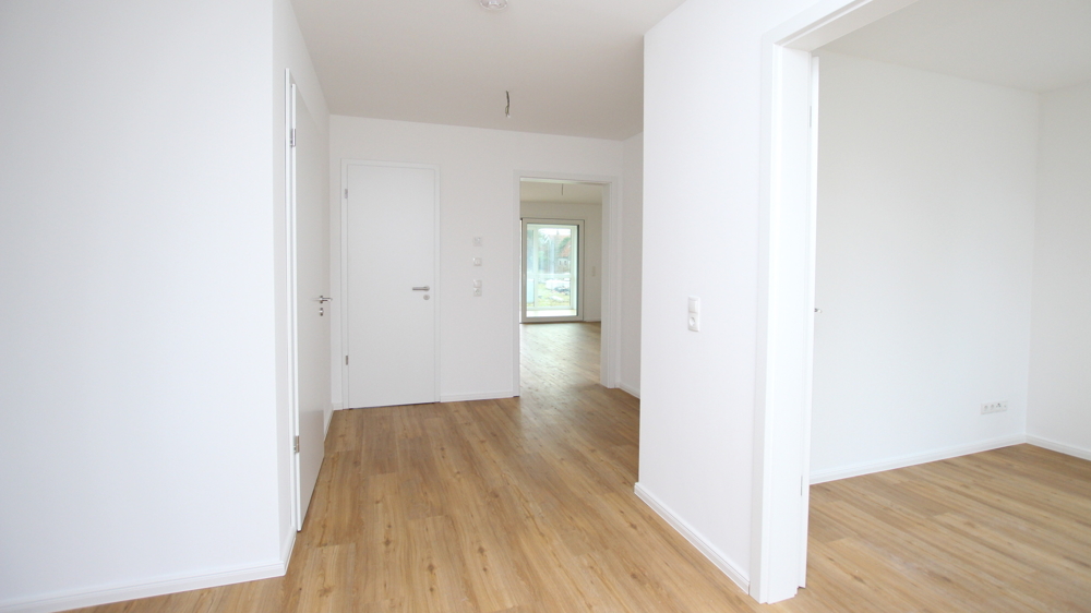 Stilvolle 3-Zimmer-Neubau-Wohnung im OG mit Wintergarten in zentraler Lage von Varel nahe Dangast