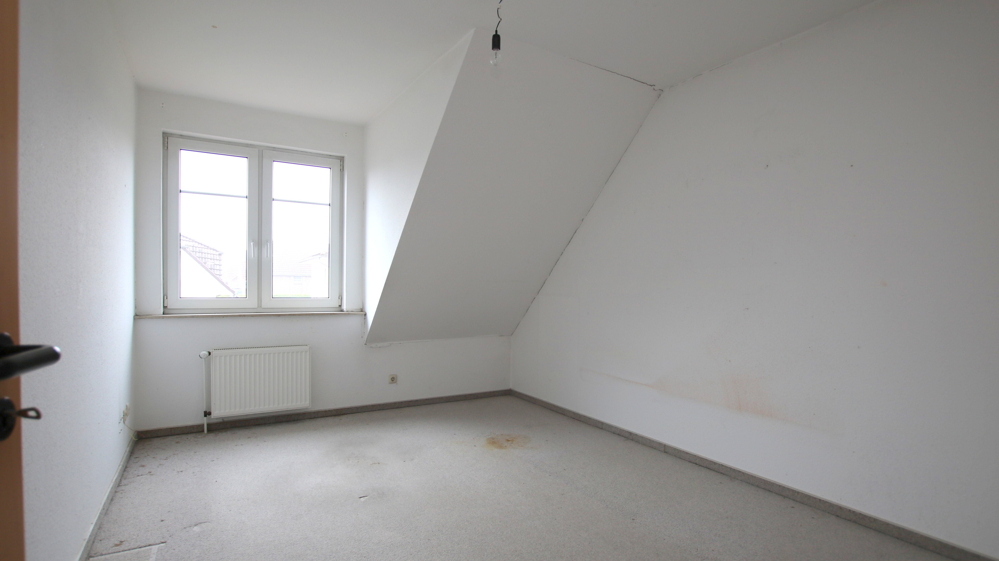 Reihenmittelhaus mit Terrasse und Carportstellplatz in Bad Zwischenahn