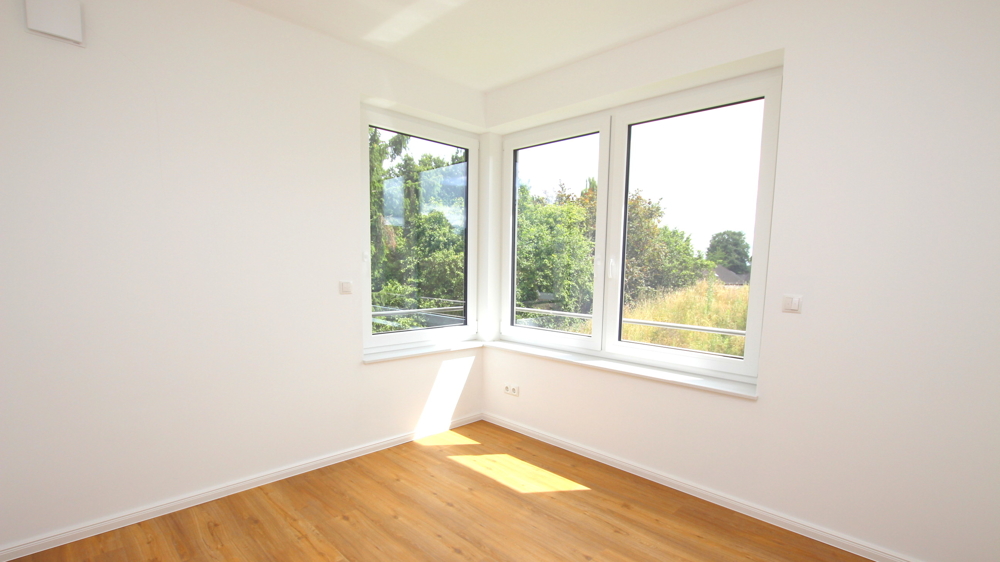 Stilvolle 3-Zimmer-Neubau-Wohnung im OG mit Wintergarten in zentraler Lage von Varel nahe Dangast