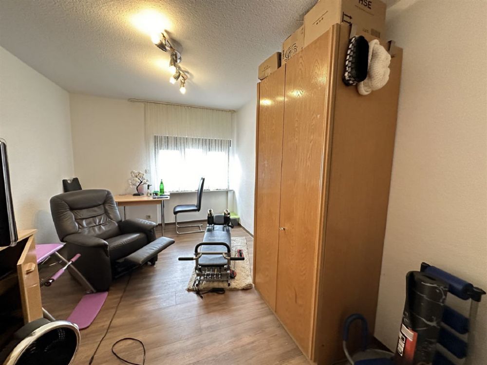 Wohn- und Geschäftshaus mit Ausbaupotenzial in zentraler Lage!