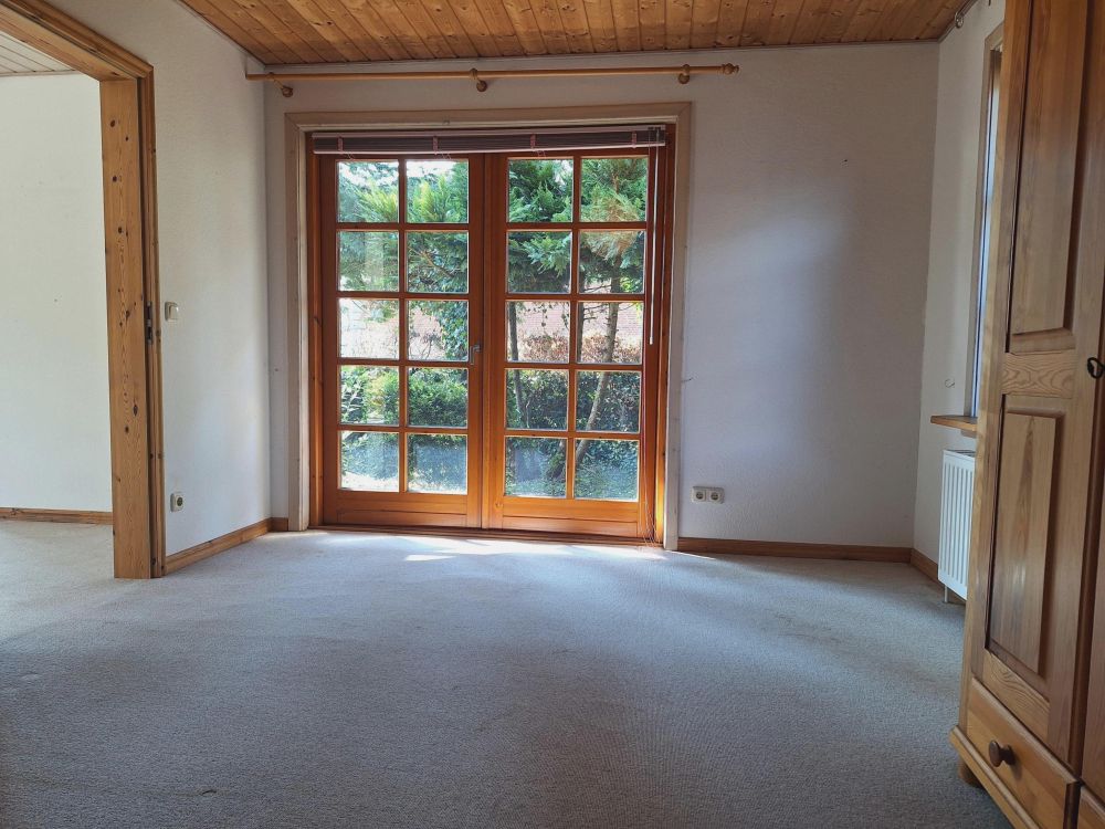 Zauberhaftes Holzbohlenhaus mit Einliegerwohnung in Mohrkirch