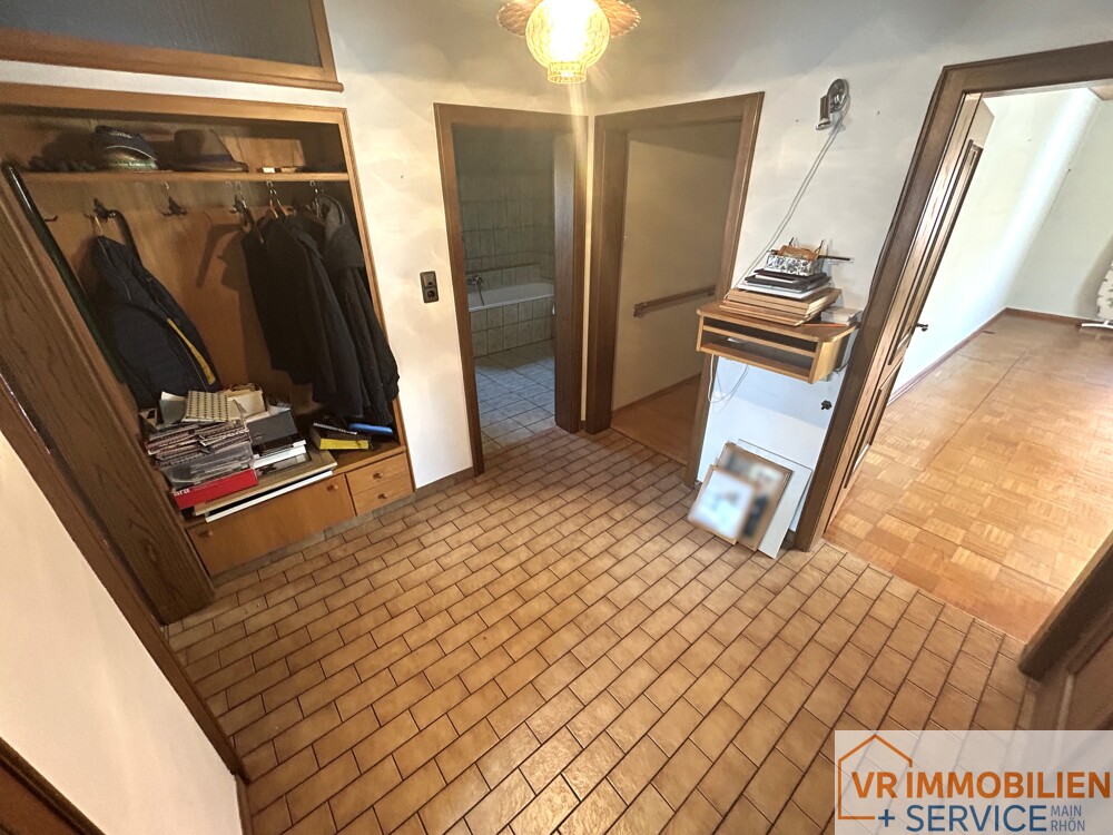 Mehr als nur vier Wände! - Einfamilienhaus mit Nebengebäude, Doppelgarage & Garten in 97618 Wollbach!