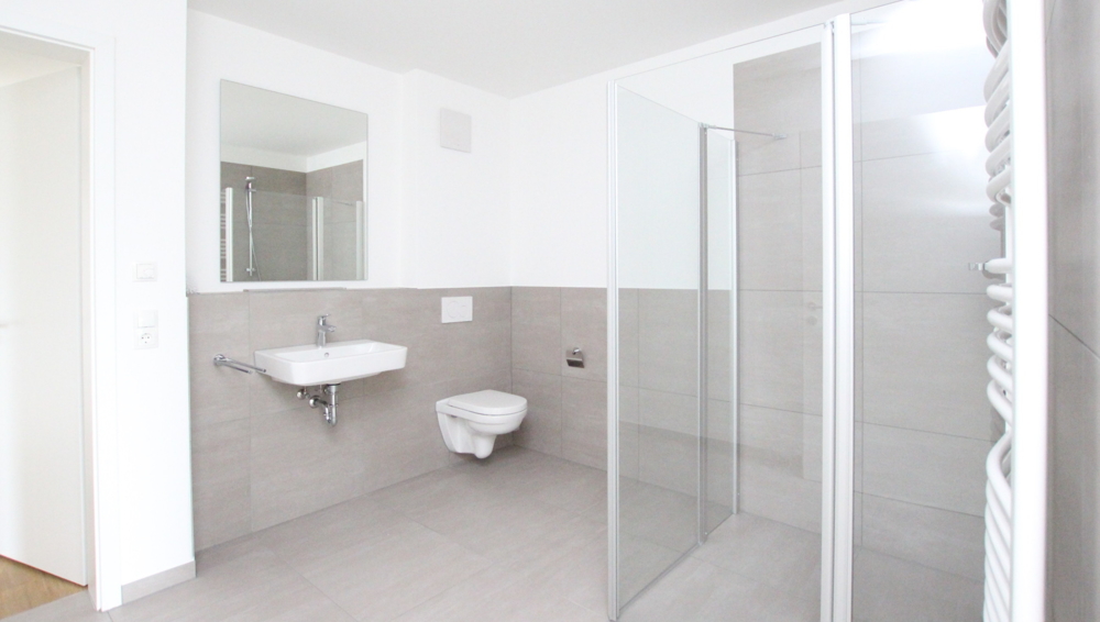 Stilvolle 3-Zimmer-Neubau-Wohnung im OG mit Wintergarten in zentraler Lage von Varel nahe Dangast