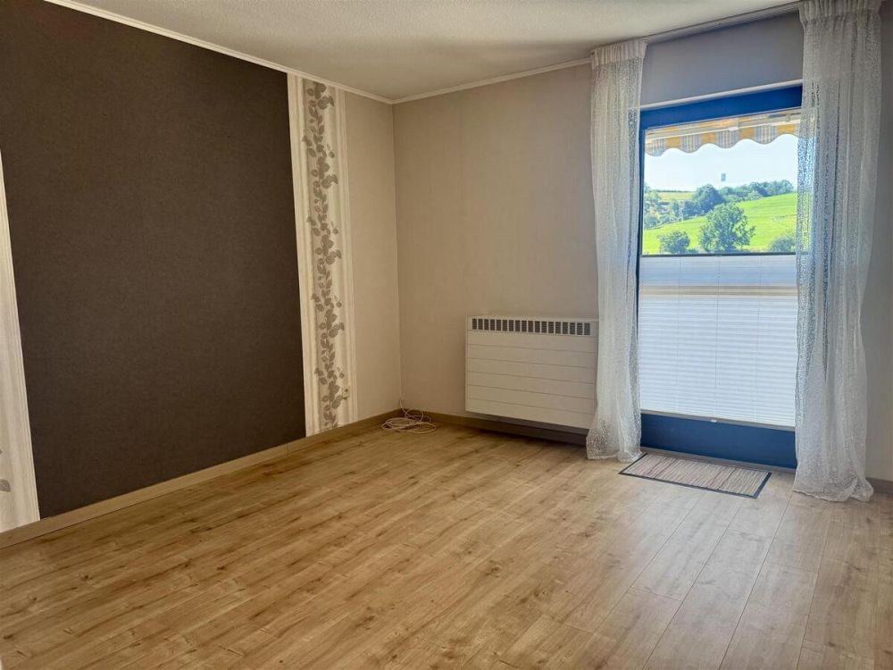 Schlafzimmer mit Balkonzugang