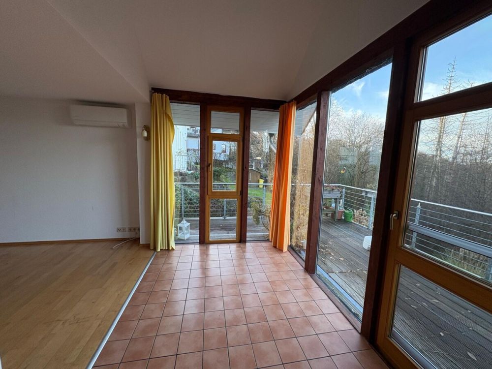 Lichtdurchfluteter Wohnbereich mit direktem Zutritt auf die große Terrasse