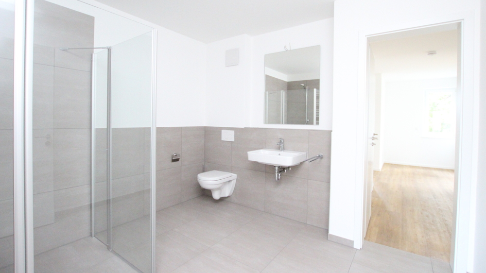 Stilvolle 3-Zimmer-Neubau-Wohnung im OG mit Wintergarten in zentraler Lage von Varel nahe Dangast